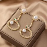 Earrings Veile Studios Gold Round Pearl With Crystal Accents And Snake Design For Women