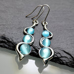 Veile Studios Bohemian Creative Curved Wavy Inlaid Hylan Cat's Eye Gemstone Swinging Earrings