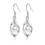 Veile Studios Simple Fashion Twisted Pearl Wave Long Tassels Drop Dangle Earrings