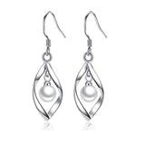 Veile Studios Simple Fashion Twisted Pearl Wave Long Tassels Drop Dangle Earrings